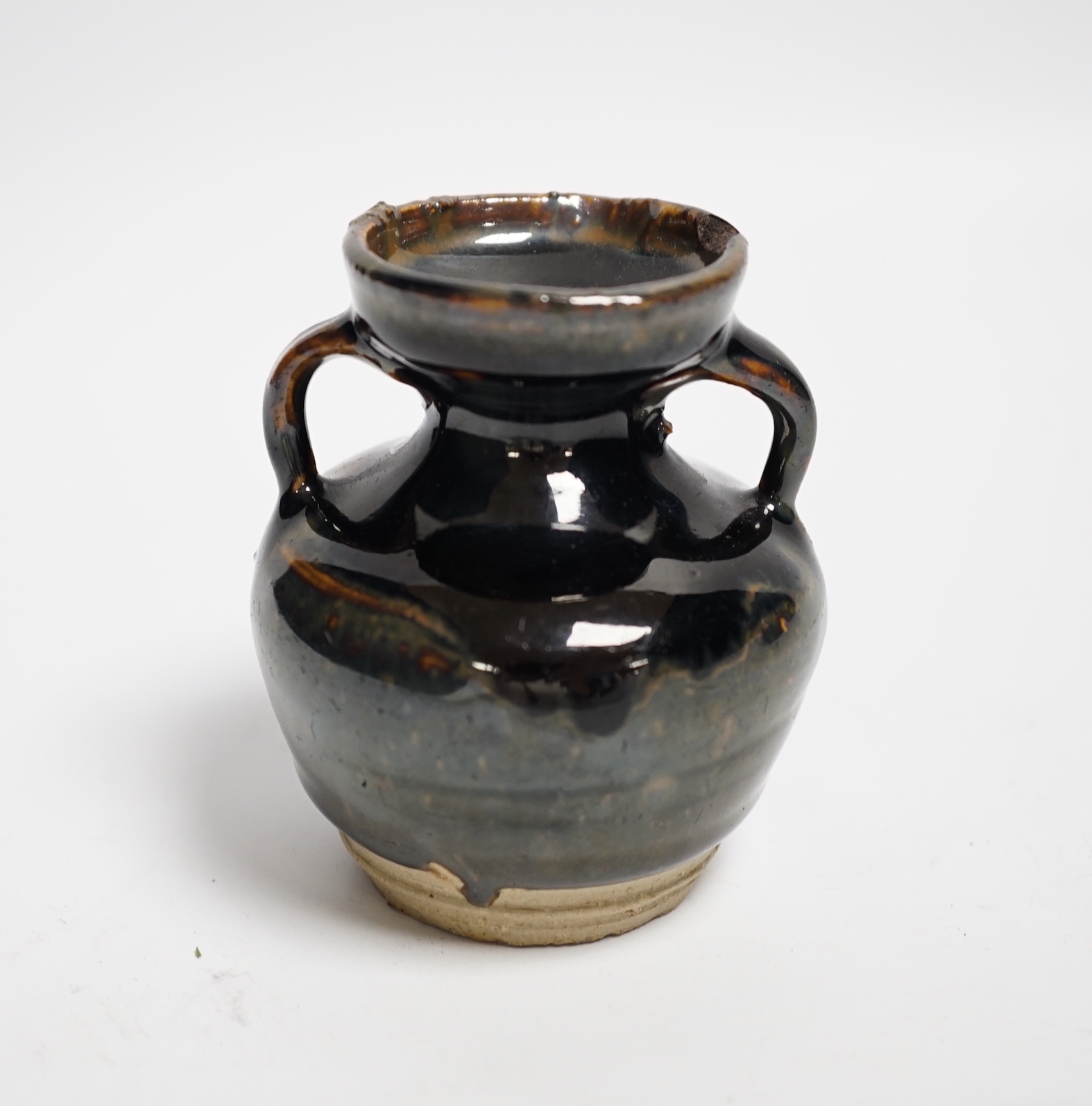 A Chinese Jian type two handled jar, possibly Song dynasty, 8cm high